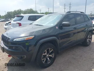 2016 Jeep Cherokee Trailhawk z VIN 1C4PJMBS0GW300131, wystawiony jako IAAI lot #42439009 z przebiegiem 173 571 mil mil oraz . Historia ofert i sprzedaży dostępna na DreamBid. Obrazek 2.