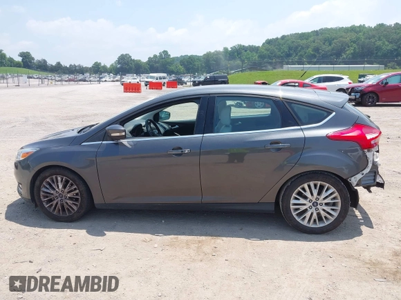 2016 Ford Focus Titanium with VIN 1FADP3N28GL299339, listed as a IAAI auction lot 42410154 with 78,245 mi miles and . Bid and sale history available at DreamBid. Image 14.