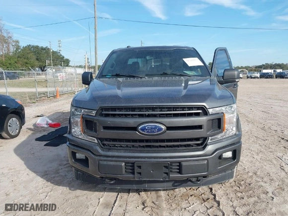 2018 Ford F-150 XL with VIN 1FTEW1E52JFB39155, listed as a IAAI auction lot 41446236 with 101,066 mi miles. Bid and sale history available at carsss.com. Image 6.