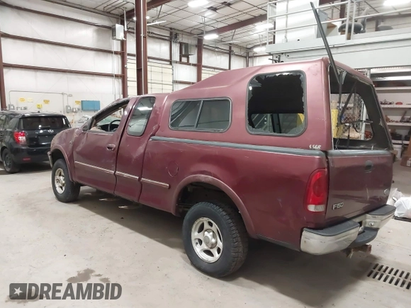1997 Ford F-150 XL with VIN 1FTEX18L3VKC91921, listed as a IAAI auction lot 41820453 with 210,553 mi miles. Bid and sale history available at carsss.com. Image 3.
