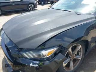 2015 Ford Mustang V6 with VIN 1FA6P8AM3F5392995, listed as a IAAI auction lot 42063188 with 128,854 mi miles and . Bid and sale history available at DreamBid. Image 6.