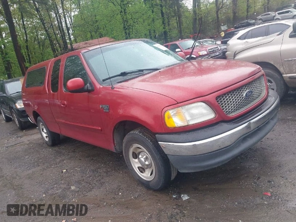 2000 Ford F-150 XL with VIN 1FTRX17W5YNB91724, listed as a IAAI auction lot 41954818 with 156,718 mi miles. Bid and sale history available at carsss.com. Image 1.
