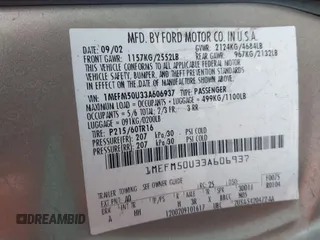2003 Mercury Sable GS z VIN 1MEFM50U33A606937, wystawiony jako IAAI lot #41058899 z przebiegiem 138 479 mil mil oraz . Historia ofert i sprzedaży dostępna na DreamBid. Obrazek 9.