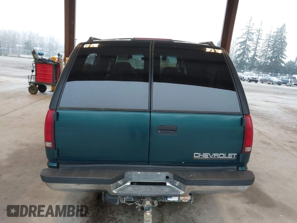 1997 Chevrolet Suburban with VIN 3GNFK16R6VG118242, listed as a IAAI auction lot 41349416 with 183,439 mi miles. Bid and sale history available at carsss.com. Image 16.