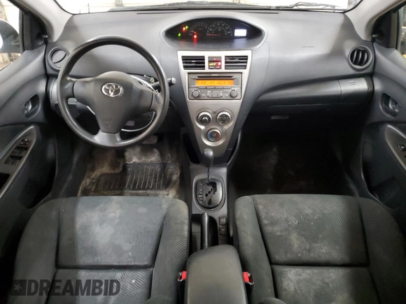 2012 Toyota Yaris z VIN JTDBT4K30CL016555, wystawiony jako Copart lot #55605565 z przebiegiem 164 046 mil mil oraz Szkoda całkowita • Salvage title. Historia ofert i sprzedaży dostępna na DreamBid. Obrazek 8.