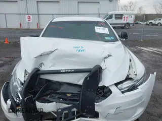 2018 Ford Police Interceptor with VIN 1FAHP2MK6JG137027, listed as a IAAI auction lot 42077115 with 123,851 mi miles and . Bid and sale history available at DreamBid. Image 12.