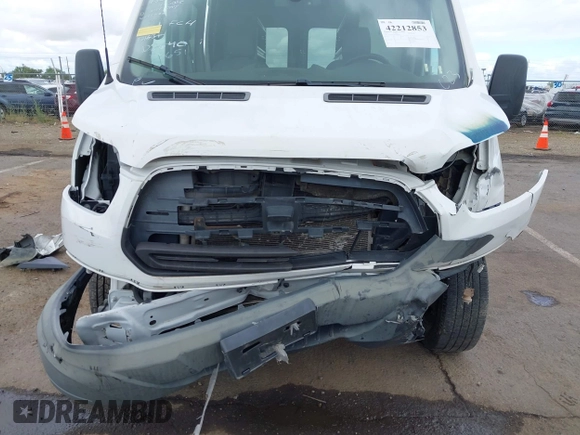 2015 Ford Transit Cargo with VIN 1FTNR2CMXFKA83472, listed as a IAAI auction lot 42212853 with 88,182 mi miles and . Bid and sale history available at DreamBid. Image 6.