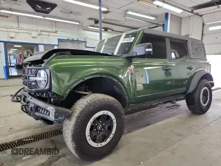 2023 Ford Bronco z VIN 1FMEE5DP9PLB54433, wystawiony jako Copart lot #60074335 z przebiegiem 23 709 mil mil oraz Szkoda całkowita • Salvage title. Historia ofert i sprzedaży dostępna na DreamBid. Obrazek 1.