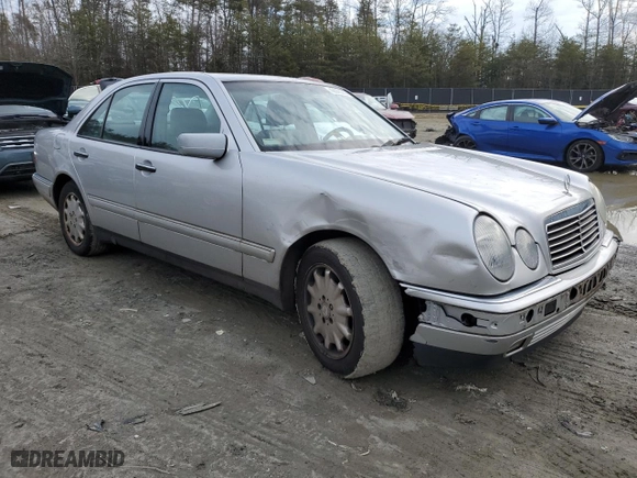 1999 Mercedes-Benz E-Class with VIN WDBJF65H0XA904616, listed as a Copart auction lot 43578035 with 140,112 mi miles and Salvage Title. Bid and sale history available at carsss.com. Image 4.