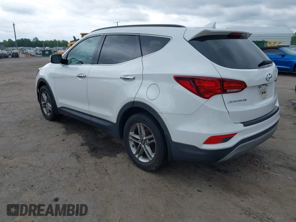 2018 Hyundai Santa Fe 2.4L z VIN 5XYZUDLB1JG543837, wystawiony jako IAAI lot #42235471 z przebiegiem 157 909 mil mil oraz . Historia ofert i sprzedaży dostępna na DreamBid. Obrazek 3.