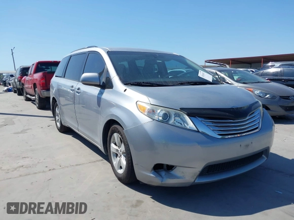 2014 Toyota Sienna LE AAS with VIN 5TDKK3DC4ES447265, listed as a IAAI auction lot 42024631 with 112,890 mi miles and . Bid and sale history available at carsss.com. Image 1.