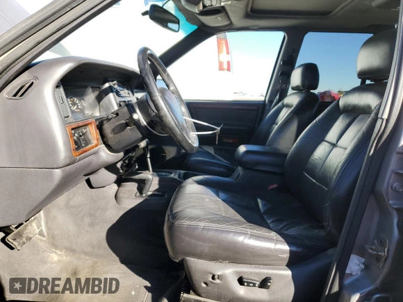 1997 Jeep Grand Cherokee Limited with VIN 1J4GZ78Y4VC568288, listed as a Copart auction lot 88265025 with 185,015 mi miles and Salvage Title. Bid and sale history available at carsss.com. Image 7.