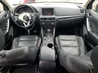 2016 Mazda CX-5 Grand Touring with VIN JM3KE2DY2G0894056, listed as a Copart auction lot 49247815 with 56,039 mi miles and Salvage Title. Bid and sale history available at carsss.com. Image 8.
