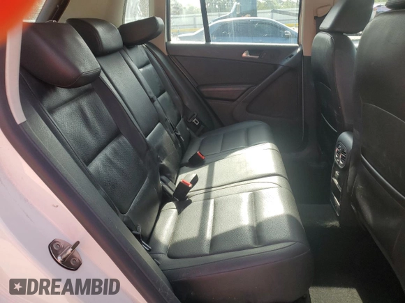 2016 Volkswagen Tiguan SE z VIN WVGBV7AX1GW528888, wystawiony jako Copart lot #59057125 z przebiegiem 143 688 mil mil oraz Czysty tytuł • Clean title. Historia ofert i sprzedaży dostępna na DreamBid. Obrazek 11.