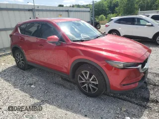 2018 Mazda CX-5 Grand Touring с VIN JM3KFBDM1J0332117, выставлен на аукционе Copart как лот 59379085 с пробегом 95 527 миль миль и Списание • Salvage title. История ставок и продаж доступна на DreamBid. Изображение 4.