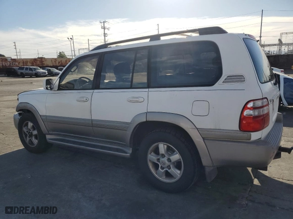 2003 Toyota Land Cruiser with VIN JTEHT05JX32035080, listed as a Copart auction lot 46715835 with 240,051 mi miles and Salvage Title. Bid and sale history available at carsss.com. Image 2.