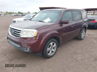 2012 Honda Pilot EX-L with VIN 5FNYF3H59CB040568, listed as a IAAI auction lot 42195882 with 211,487 mi miles and . Bid and sale history available at carsss.com. Image 2.
