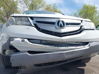 2009 Acura MDX z VIN 2HNYD28289H503786, wystawiony jako IAAI lot #42019947 z przebiegiem 209 425 mil mil oraz . Historia ofert i sprzedaży dostępna na DreamBid. Obrazek 6.