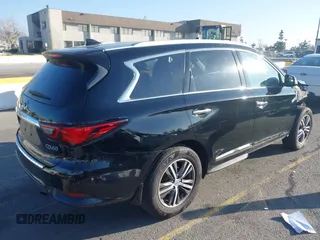 2019 Infiniti QX60 Luxe with VIN 5N1DL0MN0KC502373, listed as a IAAI auction lot 41646327 with 69,250 mi miles and . Bid and sale history available at DreamBid. Image 4.