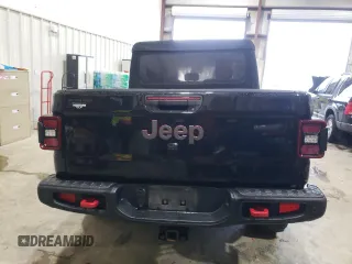 2020 Jeep Gladiator Rubicon with VIN 1C6JJTBG9LL183888, listed as a Copart auction lot 70225794 with 57,969 mi miles and Salvage title. Bid and sale history available at DreamBid. Image 6.