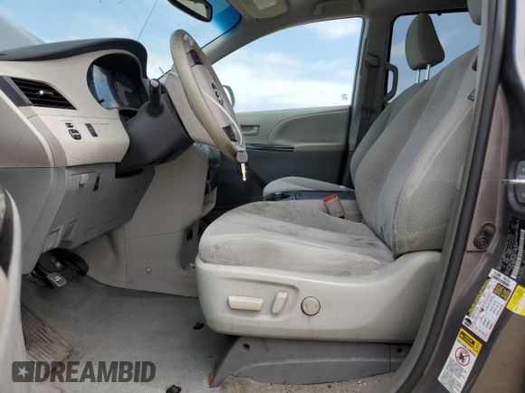 2014 Toyota Sienna LE AAS with VIN 5TDKK3DC6ES491574, listed as a Copart auction lot 59815785 with 189,975 mi miles and Salvage title. Bid and sale history available at DreamBid. Image 7.