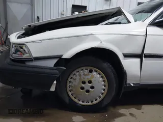 1990 Toyota Camry z VIN JT2SV21E5L3398379, wystawiony jako IAAI lot #41699413 z przebiegiem 100 136 mil mil oraz . Historia ofert i sprzedaży dostępna na DreamBid. Obrazek 16.