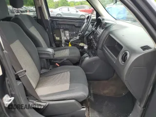 2014 Jeep Patriot Latitude with VIN 1C4NJRFB2ED718259, listed as a Copart auction lot 58095825 with 116,665 mi miles and Salvage title. Bid and sale history available at DreamBid. Image 7.