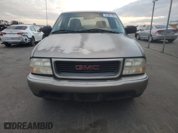 2000 GMC Sonoma SLS z VIN 1GTCS19W9Y8163781, wystawiony jako Copart lot #81001704 z przebiegiem 132 301 mil mil oraz Szkody całkowita. Historia ofert i sprzedaży dostępna na DreamBid. Obrazek 5.