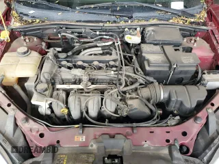 2007 Ford Focus S z VIN 1FAFP34N77W249390, wystawiony jako Copart lot #61817215 z przebiegiem 112 295 mil mil oraz Szkoda całkowita • Salvage title. Historia ofert i sprzedaży dostępna na DreamBid. Obrazek 11.