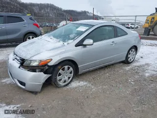 2007 Honda Civic Cpe LX with VIN 2HGFG12627H505932, listed as a IAAI auction lot 41609140 with 188,438 mi miles. Bid and sale history available at carsss.com. Image 2.