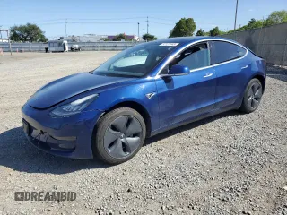 2019 Tesla Model 3 Mid Range z VIN 5YJ3E1EA2KF485767, wystawiony jako Copart lot #57127045 z przebiegiem 64 454 mil mil oraz Szkoda całkowita • Salvage title. Historia ofert i sprzedaży dostępna na DreamBid. Obrazek 1.