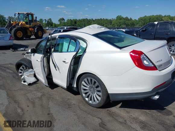 2014 Lincoln MKS with VIN 1LNHL9DK2EG612009, listed as a IAAI auction lot 39278558 with 56,893 mi miles. Bid and sale history available at carsss.com. Image 3.
