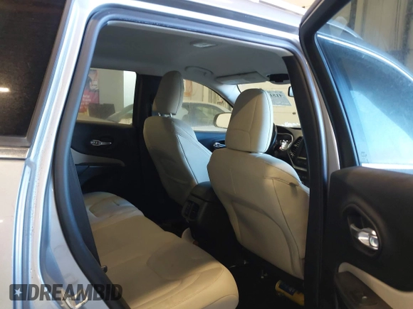 2015 Jeep Cherokee Latitude with VIN 1C4PJMCS5FW510298, listed as a IAAI auction lot 41518453 with 99,568 mi miles and . Bid and sale history available at DreamBid. Image 8.