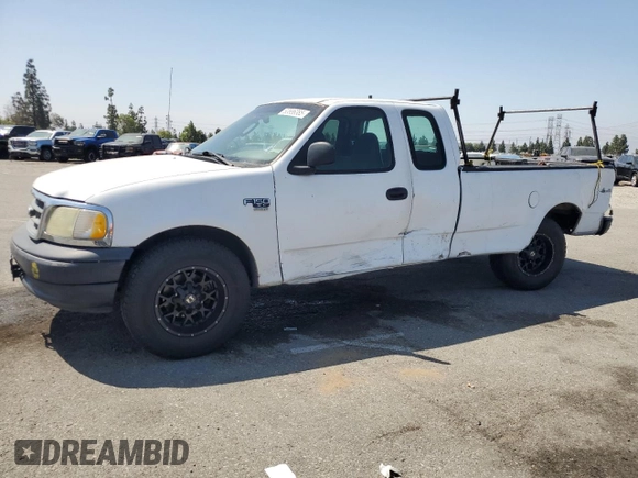 2003 Ford F-150 XL with VIN 1FTRX17W53NA54971, listed as a Copart auction lot 63686385 with 133,800 mi miles and Salvage title. Bid and sale history available at DreamBid. Image 1.