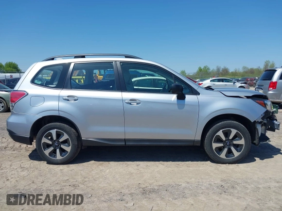 2018 Subaru Forester z VIN JF2SJABC2JH463734, wystawiony jako IAAI lot #42222872 z przebiegiem 64 667 mil mil oraz . Historia ofert i sprzedaży dostępna na DreamBid. Obrazek 14.