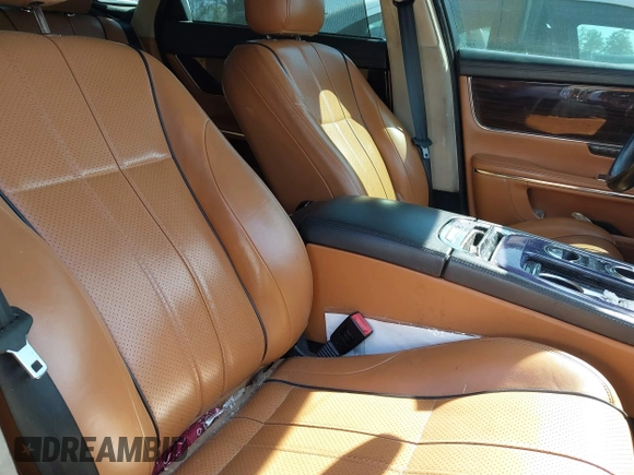 2013 Jaguar XJ Portfolio z VIN SAJWJ2GD0D8V49329, wystawiony jako IAAI lot #41829426 z przebiegiem 125 584 mil mil oraz . Historia ofert i sprzedaży dostępna na DreamBid. Obrazek 5.