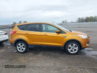 2016 Ford Escape SE with VIN 1FMCU0GX3GUB75572, listed as a IAAI auction lot 41869920 with 154,586 mi miles and . Bid and sale history available at carsss.com. Image 13.