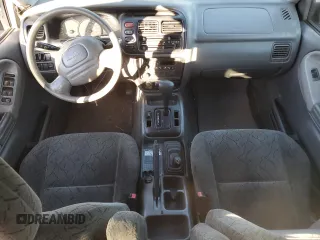 2004 Chevrolet Tracker ZR2 with VIN 2CNBJ734246907452, listed as a Copart auction lot 73102754 with 286,234 mi miles and Clean title. Bid and sale history available at DreamBid. Image 8.