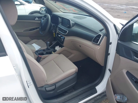2019 Hyundai Tucson SE with VIN KM8J23A46KU048921, listed as a IAAI auction lot 40781586 with 57,186 mi miles. Bid and sale history available at carsss.com. Image 5.