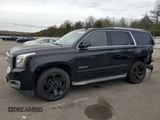 2015 GMC Yukon Denali with VIN 1GKS2CKJXFR277516, listed as a Copart auction lot 72070594 with 86,353 mi miles and Salvage Title. Bid and sale history available at carsss.com. Image 1.