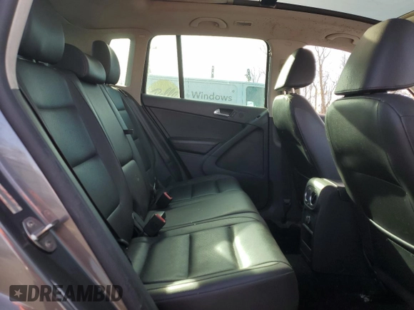 2013 Volkswagen Tiguan S z VIN WVGBV3AX3DW073322, wystawiony jako Copart lot #79616044 z przebiegiem 96 366 mil mil oraz Szkoda całkowita • Salvage title. Historia ofert i sprzedaży dostępna na DreamBid. Obrazek 11.