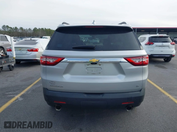 2019 Chevrolet Traverse LT with VIN 1GNERHKW6KJ140036, listed as a IAAI auction lot 41610615 with 98,685 mi miles and . Bid and sale history available at DreamBid. Image 16.
