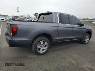 2024 Honda Ridgeline RTL with VIN 5FPYK3F54RB016029, listed as a Copart auction lot 82542864 with 6,745 mi miles and Salvage title. Bid and sale history available at DreamBid. Image 3.