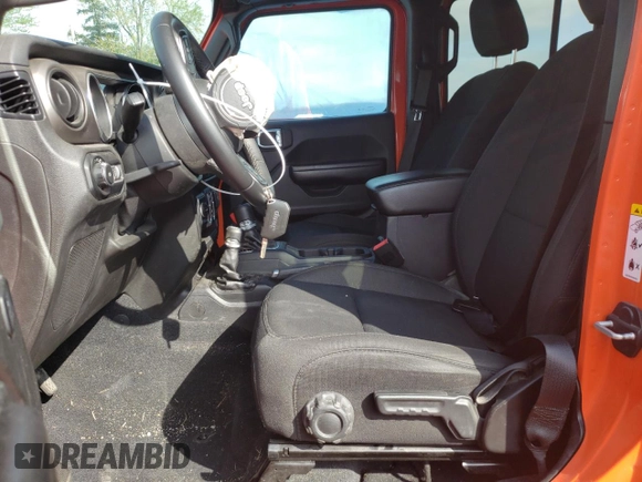2019 Jeep Wrangler Unlimited Sport S with VIN 1C4HJXDGXKW557241, listed as a Copart auction lot 52485164 with 59,798 mi miles and Salvage title. Bid and sale history available at DreamBid. Image 7.