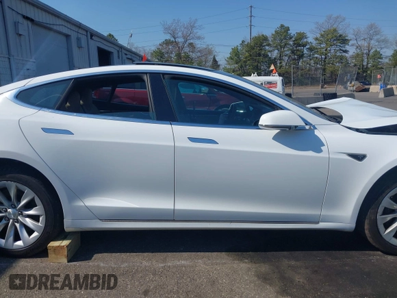 2016 Tesla Model S 90D with VIN 5YJSA1E26GF147327, listed as a IAAI auction lot 42077766 with 89,502 mi miles and . Bid and sale history available at DreamBid. Image 13.