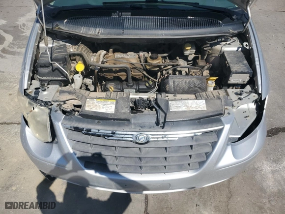 2007 Chrysler Town & Country LWB LX with VIN 2A4GP44R57R339793, listed as a Copart auction lot 71032054 with 181,828 mi miles and Salvage Title. Bid and sale history available at carsss.com. Image 12.
