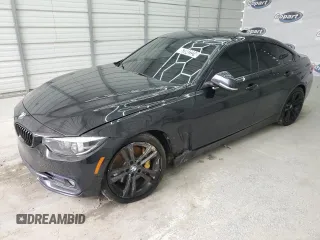 2018 BMW 4 Series 440i with VIN WBA4J5C59JBF07309, listed as a Copart auction lot 74893994 with 89,054 mi miles and Salvage Title. Bid and sale history available at carsss.com. Image 1.