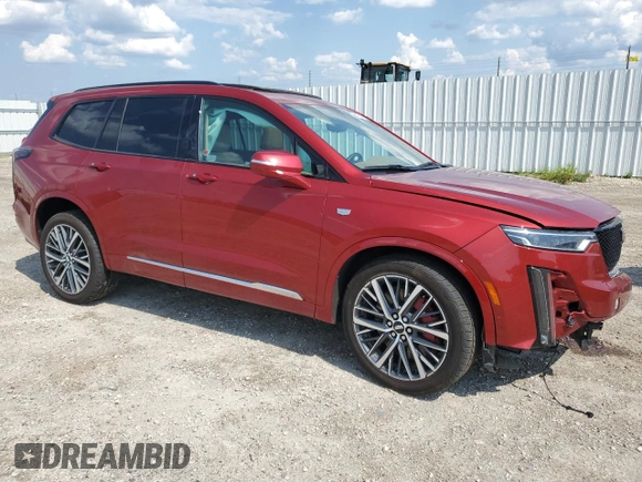 2024 Cadillac XT6 AWD Sport z VIN 1GYKPHRS0RZ724524, wystawiony jako Copart lot #61333185 z przebiegiem 12 799 mil mil oraz Nie do naprawy • Non repairable. Historia ofert i sprzedaży dostępna na DreamBid. Obrazek 4.