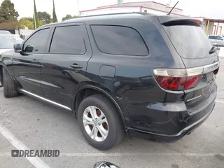 2012 Dodge Durango Crew with VIN 1C4SDHDT0CC321037, listed as a IAAI auction lot 42793232 with 162,593 mi miles and . Bid and sale history available at DreamBid. Image 3.