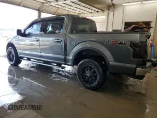 2018 Ford F-150 XL with VIN 1FTEW1E51JFD24037, listed as a Copart auction lot 59372655 with 98,465 mi miles and Salvage title. Bid and sale history available at DreamBid. Image 2.